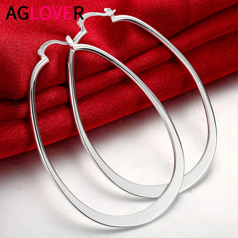 AGLOVER 925 Sterling Silver 68MM Smooth Round Hoop Earrings For Woman Best Gift Fashion Charm High Quality Wedding Jewelry
AGLOVER 925 Sterling Silver 68MM Smooth Round Hoop Earrings For Woman Best Gift Fashion Charm High Quality Wedding Jewelry