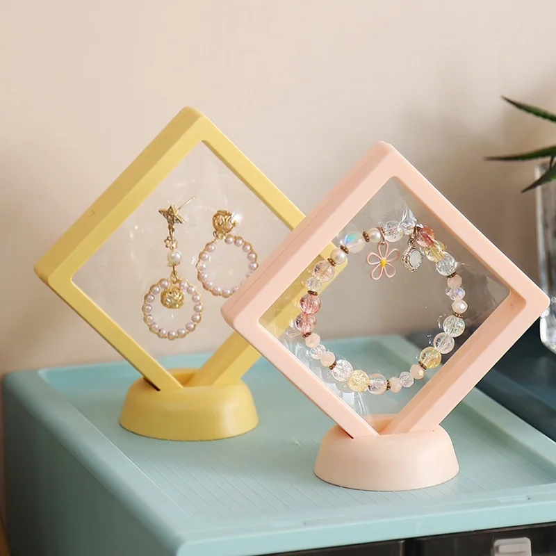 Black White Plastic Suspended Floating Display Case Earring Coin Gems Ring Jewelry Storage Pet Membrane Stand Holder Box 7*7*2cm
Black White Plastic Suspended Floating Display Case Earring Coin Gems Ring Jewelry Storage Pet Membrane Stand Holder Box 7*7*2cm