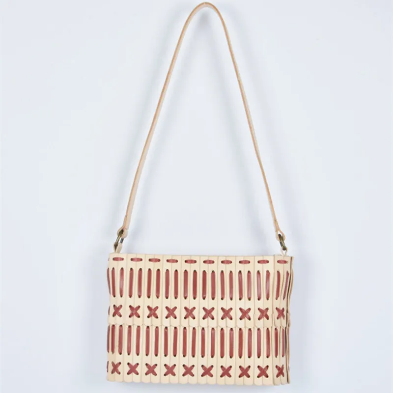 Fashionable new style underarm bag 100% first layer cowhide shoulder bag hand-woven striped stitching small square bag
Fashionable new style underarm bag 100% first layer cowhide shoulder bag hand-woven striped stitching small square bag