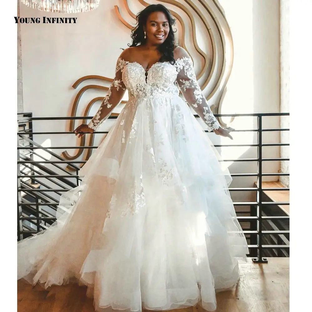 Custom Made Ball Gown Wedding Dresses 2021 Long Sleeves Bridal Gown Backless Scoop Chapel Train Applique White Plus Size Bride
Custom Made Ball Gown Wedding Dresses 2021 Long Sleeves Bridal Gown Backless Scoop Chapel Train Applique White Plus Size Bride