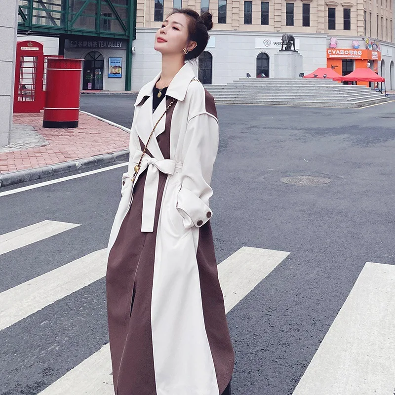 High-Quality Fashion Women's Stitching Windbreaker Lapel Over-the-Knee Overcoat Retro Design Loose Long Trench Coat
High-Quality Fashion Women's Stitching Windbreaker Lapel Over-the-Knee Overcoat Retro Design Loose Long Trench Coat