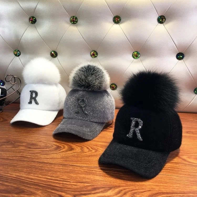 Hat female autumn and winter seahorse feather duck tongue Hat Women's Rhinestone R letter detachable f imitation fox hairball
Hat female autumn and winter seahorse feather duck tongue Hat Women's Rhinestone R letter detachable f imitation fox hairball