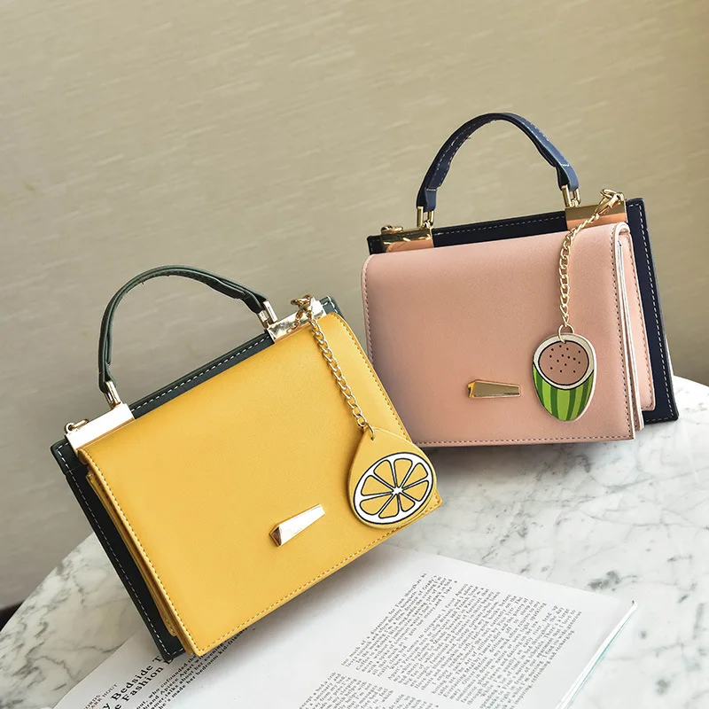 Luxury Designer Handbag Fashion Trend Lemon Watermelon Fruit Pendant Portable Solid Color Bags Double-sided Single Shoulder Bag
Luxury Designer Handbag Fashion Trend Lemon Watermelon Fruit Pendant Portable Solid Color Bags Double-sided Single Shoulder Bag