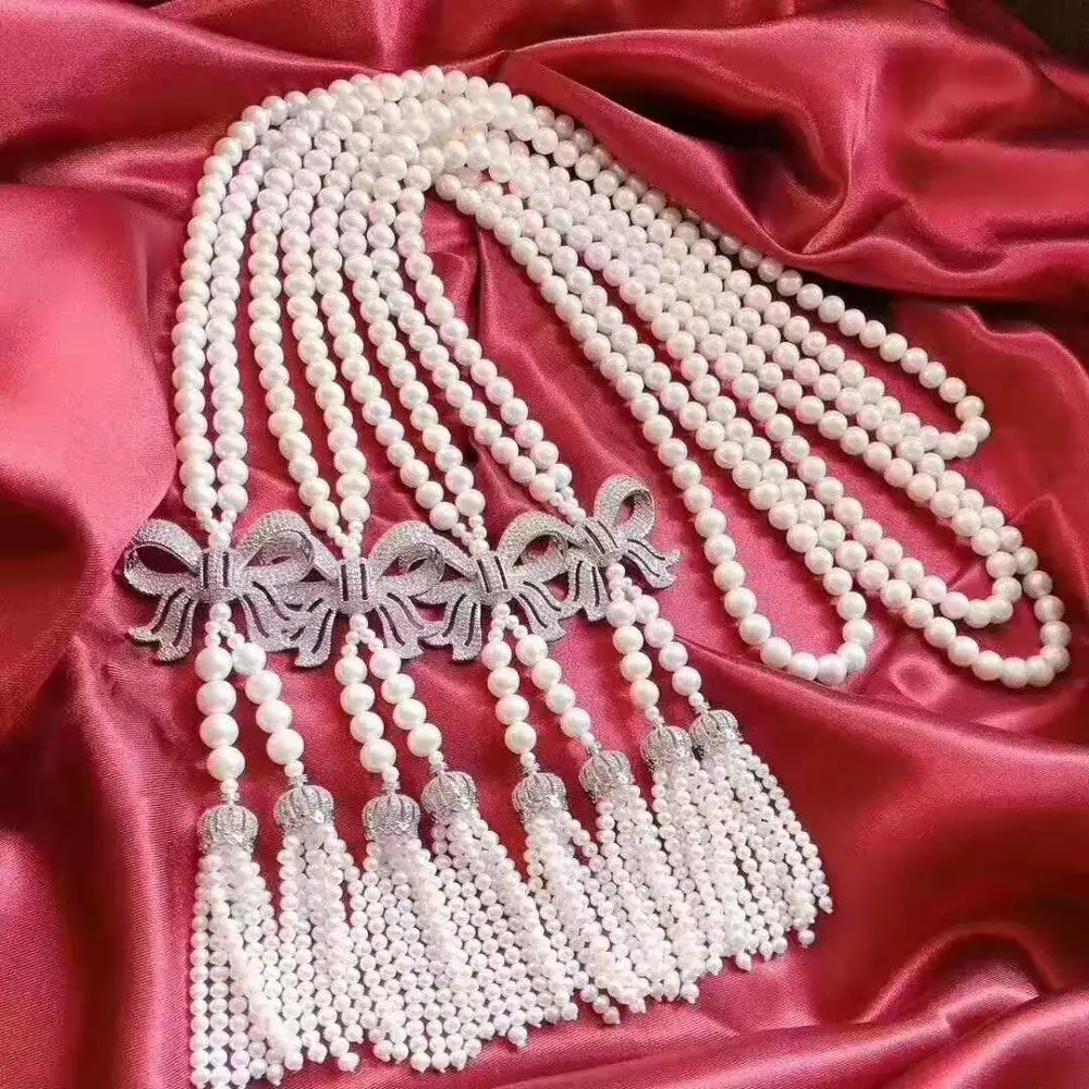 Women's fashion jewelry micro inlaid zircon bow accessories 3-4-5-6-7-8-9mm freshwater pearl tassel pendant necklace 
Women's fashion jewelry micro inlaid zircon bow accessories 3-4-5-6-7-8-9mm freshwater pearl tassel pendant necklace