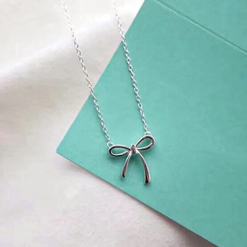 Women's Necklace Sweet Bow Pendant Chain Brand Jewelry 925 Sterling Silver High Quality Luxury Necklace Type Pendant Size Style
Women's Necklace Sweet Bow Pendant Chain Brand Jewelry 925 Sterling Silver High Quality Luxury Necklace Type Pendant Size Style