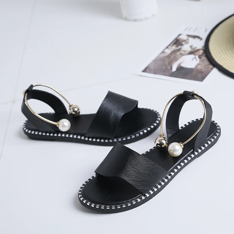 2022 New Korean Sandals Female Summer Pearl Women's Shoes One Word Buckle Fashion All-match Student Flat Open Toe Sandals
2022 New Korean Sandals Female Summer Pearl Women's Shoes One Word Buckle Fashion All-match Student Flat Open Toe Sandals