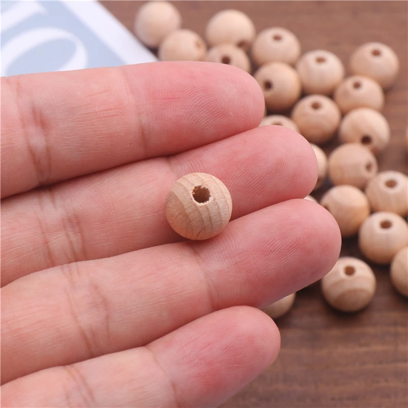 30/50/100 Pcs/Lot Wooden Beads 12/15mm Baby Foods Grade Teether Beads for Baby DIY Chew Rattle Toy Pacifier Chain Accesories
30/50/100 Pcs/Lot Wooden Beads 12/15mm Baby Foods Grade Teether Beads for Baby DIY Chew Rattle Toy Pacifier Chain Accesories
