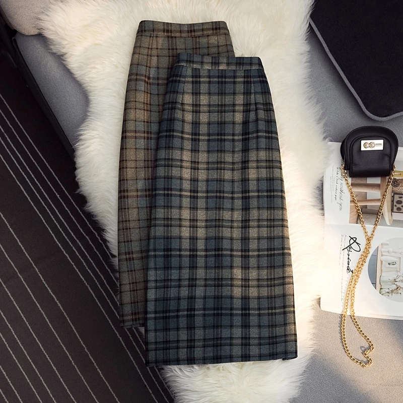 the female in the new winter long lattice woolen cloth skirt to show thin package hip A word skirt of tall waist skirt
the female in the new winter long lattice woolen cloth skirt to show thin package hip A word skirt of tall waist skirt