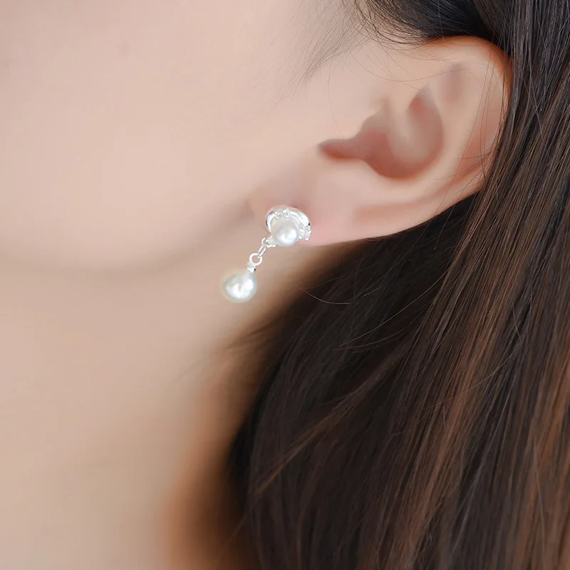 High Quality Simulated Pearl Charm Statement Earrings Women Fashion 925 Sterling Silver Stud Earrings
High Quality Simulated Pearl Charm Statement Earrings Women Fashion 925 Sterling Silver Stud Earrings