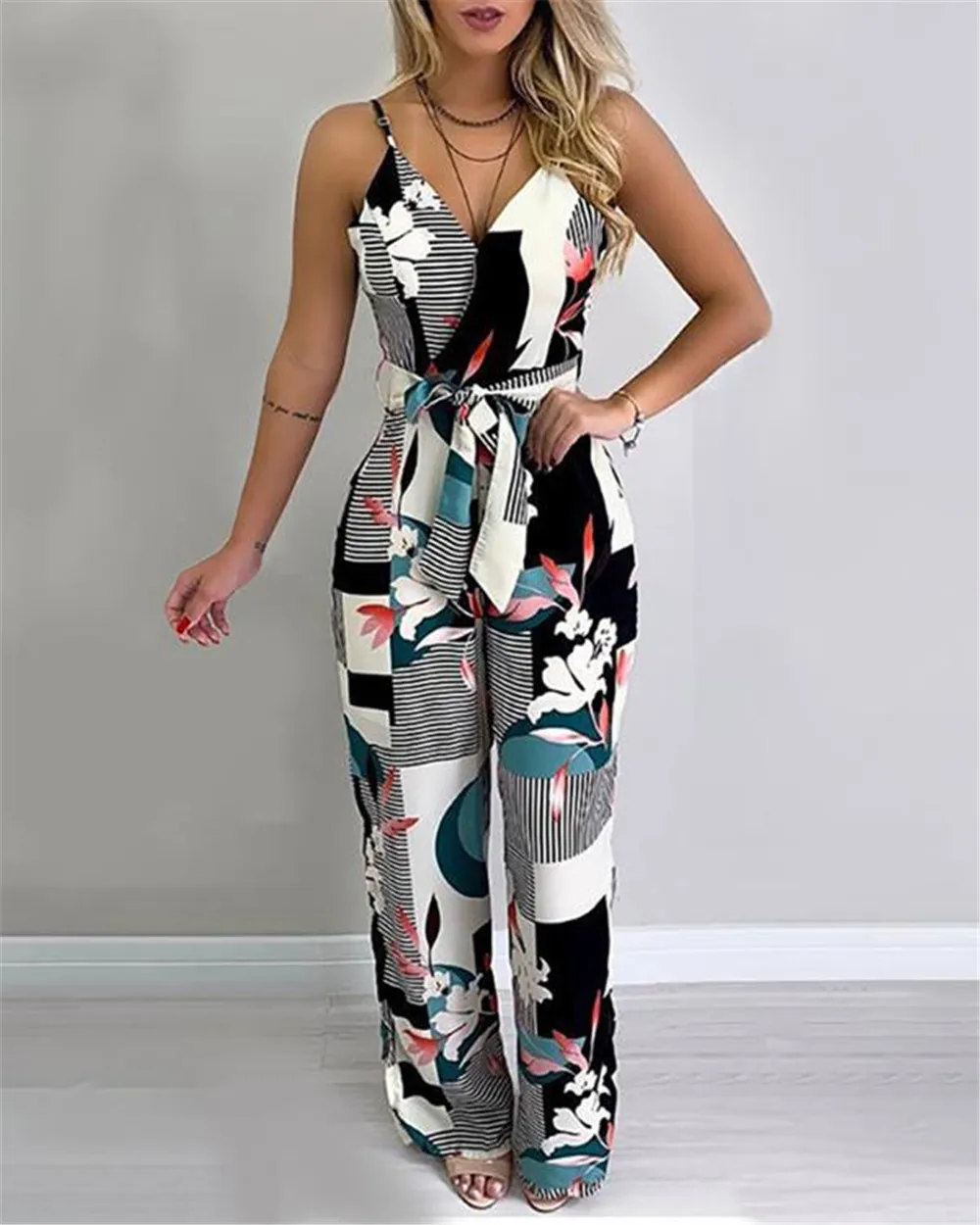 New style European and American printed jumpsuit sexy suspender temperament wide-leg jumpsuit 
New style European and American printed jumpsuit sexy suspender temperament wide-leg jumpsuit