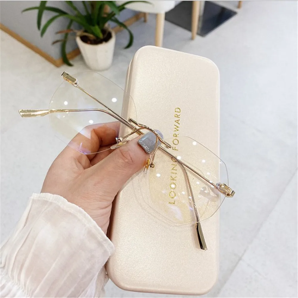Irregular Blue Llight Blocking Rimless Glasses Frame Women Spectacle Myopia Transparent Glasses Men Eyeglasses Optical Frames
Irregular Blue Llight Blocking Rimless Glasses Frame Women Spectacle Myopia Transparent Glasses Men Eyeglasses Optical Frames