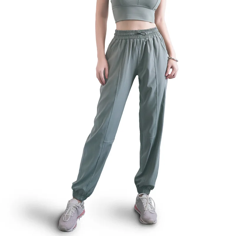 High Quality Sport Drawstring Waist Jogging Pants Women Outdoor Breathable Running Sportswear Loose Training Pants Sweatpants
High Quality Sport Drawstring Waist Jogging Pants Women Outdoor Breathable Running Sportswear Loose Training Pants Sweatpants