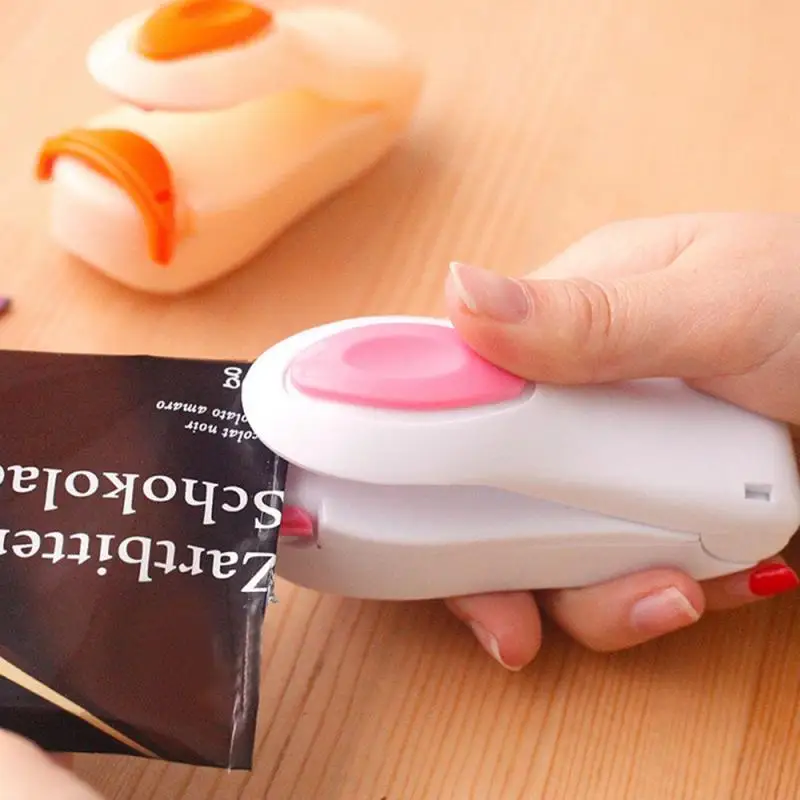 Portable Handheld Household Colorful Electronic Mini Heat Sealing Machine Plastic Food Snacks Bag Packing Heat Clip Sealer Tools
Portable Handheld Household Colorful Electronic Mini Heat Sealing Machine Plastic Food Snacks Bag Packing Heat Clip Sealer Tools