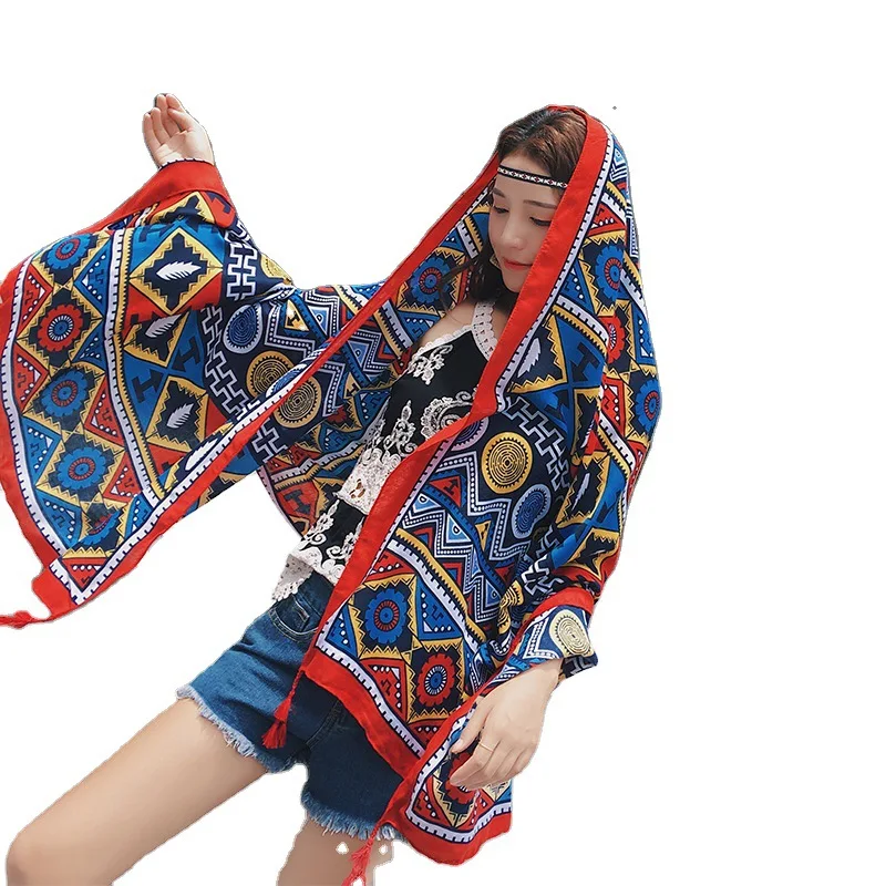 The new national wind scarf women's sea border sunbathing tourism shawl 
The new national wind scarf women's sea border sunbathing tourism shawl