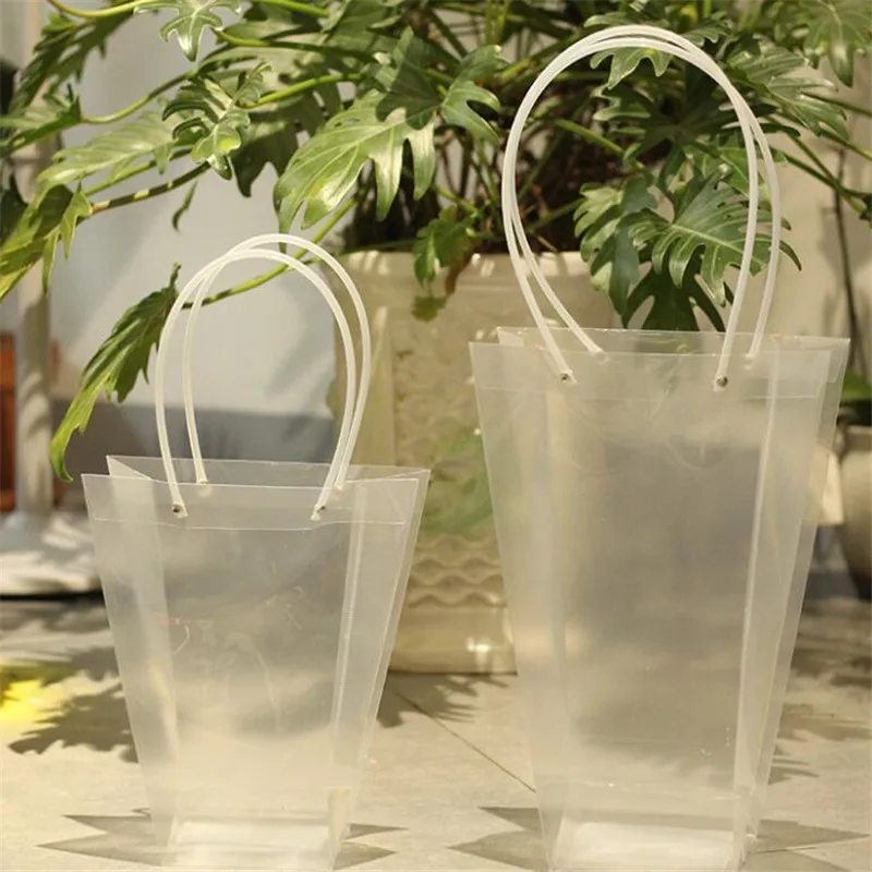Flower Shop Special Portable Packaging Plastic Bag Transparent Long Handle T-shaped Portable Flower Bag Potted Bag Wholesale
Flower Shop Special Portable Packaging Plastic Bag Transparent Long Handle T-shaped Portable Flower Bag Potted Bag Wholesale