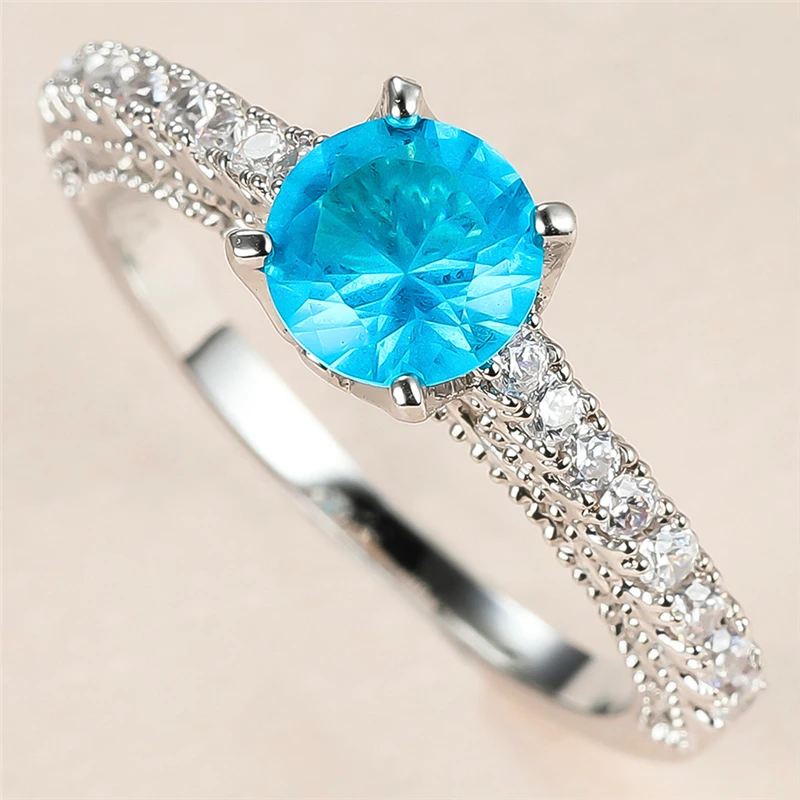 Dainty Female Aqua Blue Crystal Stone Ring Charm Silver Color Wedding Rings For Women Vintage Bride Round Zircon Engagement Ring
Dainty Female Aqua Blue Crystal Stone Ring Charm Silver Color Wedding Rings For Women Vintage Bride Round Zircon Engagement Ring