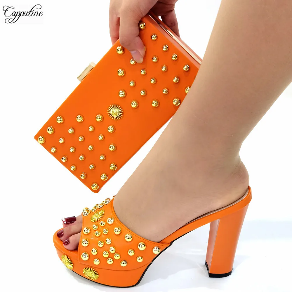 Orange Ladies Shoes And Clutch Bag High Heels 10.3CM Women Pumps Matching With Purse Handbag Set Slippers Sandals Party CR140
Orange Ladies Shoes And Clutch Bag High Heels 10.3CM Women Pumps Matching With Purse Handbag Set Slippers Sandals Party CR140