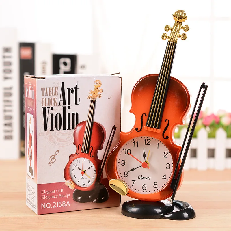 Fashion cute Fake Violin Shape Kids Toy Alarm Clock Desktop Clock Students Style Clock Eco-friendly Material For home decoration
Fashion cute Fake Violin Shape Kids Toy Alarm Clock Desktop Clock Students Style Clock Eco-friendly Material For home decoration
