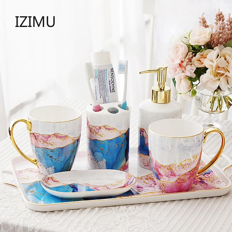 European Luxury Ceramic Wash Set Bathroom Five piece set Soap Dispenser Gargle Cup Toothbrush Holder Christmas Wedding gifts 
European Luxury Ceramic Wash Set Bathroom Five piece set Soap Dispenser Gargle Cup Toothbrush Holder Christmas Wedding gifts