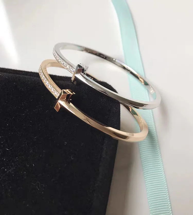 

The same type of star T1 cross line cold wind wide and narrow bracelet, fashionable stainless steel alloy lady T-shaped Bangle