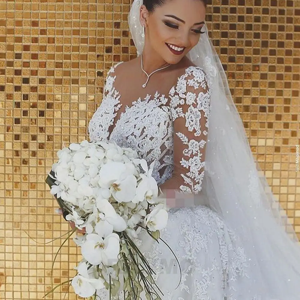 Блестящее кружевное свадебное платье Русалка иллюзионный лиф vestido de noiva с длинным рукавом Прозрачный вырез аппликации свадебные платья вес... 
Блестящее кружевное свадебное платье Русалка иллюзионный лиф vestido de noiva с длинным рукавом Прозрачный вырез аппликации свадебные платья вес...