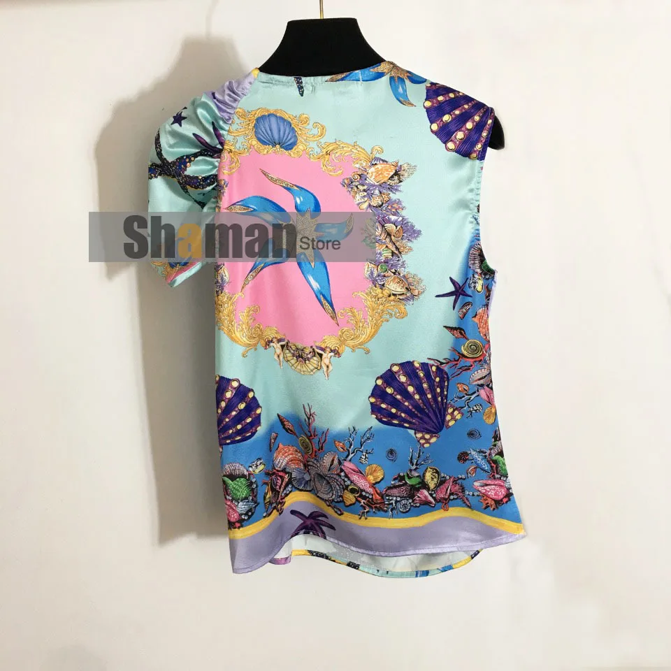 Luxury Design Women 2021 Summer Branded New Metal Circle Knot Starfish Shell Print Irregular Short Sleeve tops blusas blouse
Luxury Design Women 2021 Summer Branded New Metal Circle Knot Starfish Shell Print Irregular Short Sleeve tops blusas blouse