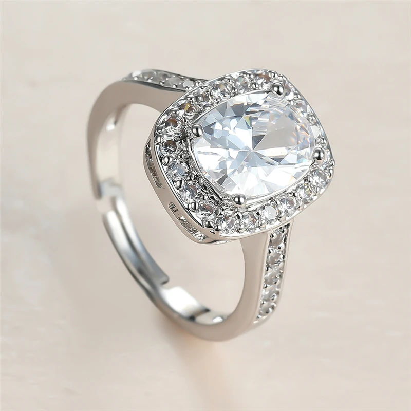 Vintage Female White Crystal Stone Ring Charm Silver Color Open Wedding Rings For Women Cute Bride Oval Zircon Engagement Ring
Vintage Female White Crystal Stone Ring Charm Silver Color Open Wedding Rings For Women Cute Bride Oval Zircon Engagement Ring