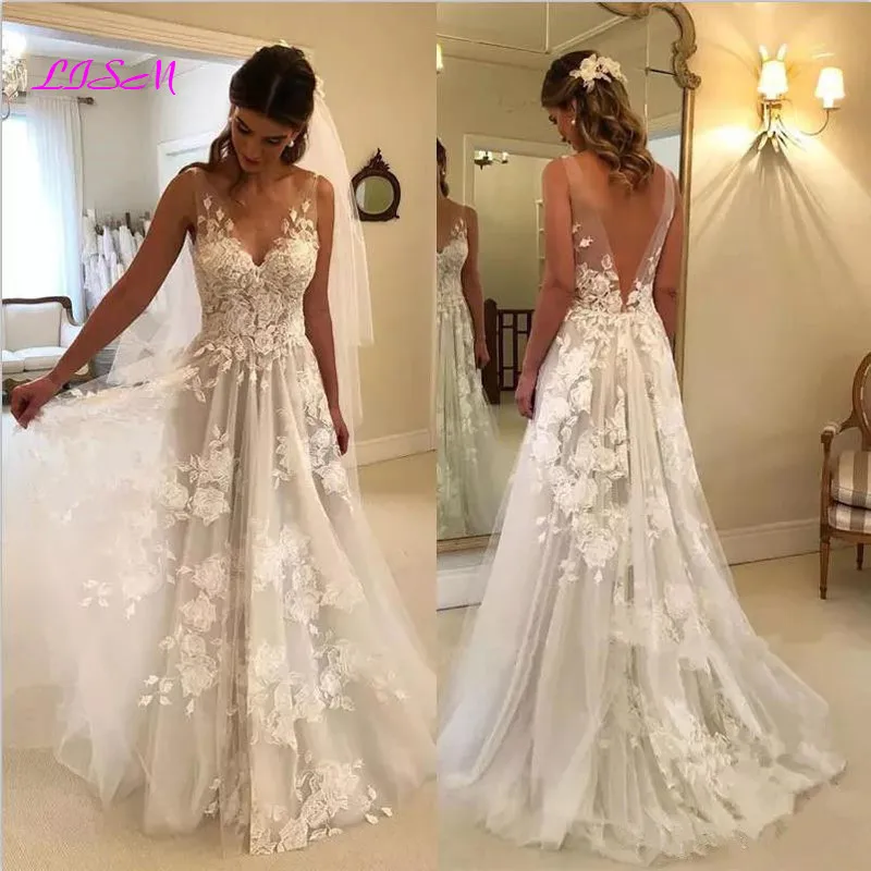Vintage Lace Appliques Boho Wedding Dresses V-Neck Backless Beach Wedding Gowns Bridal Dress vestidos de novia
Vintage Lace Appliques Boho Wedding Dresses V-Neck Backless Beach Wedding Gowns Bridal Dress vestidos de novia