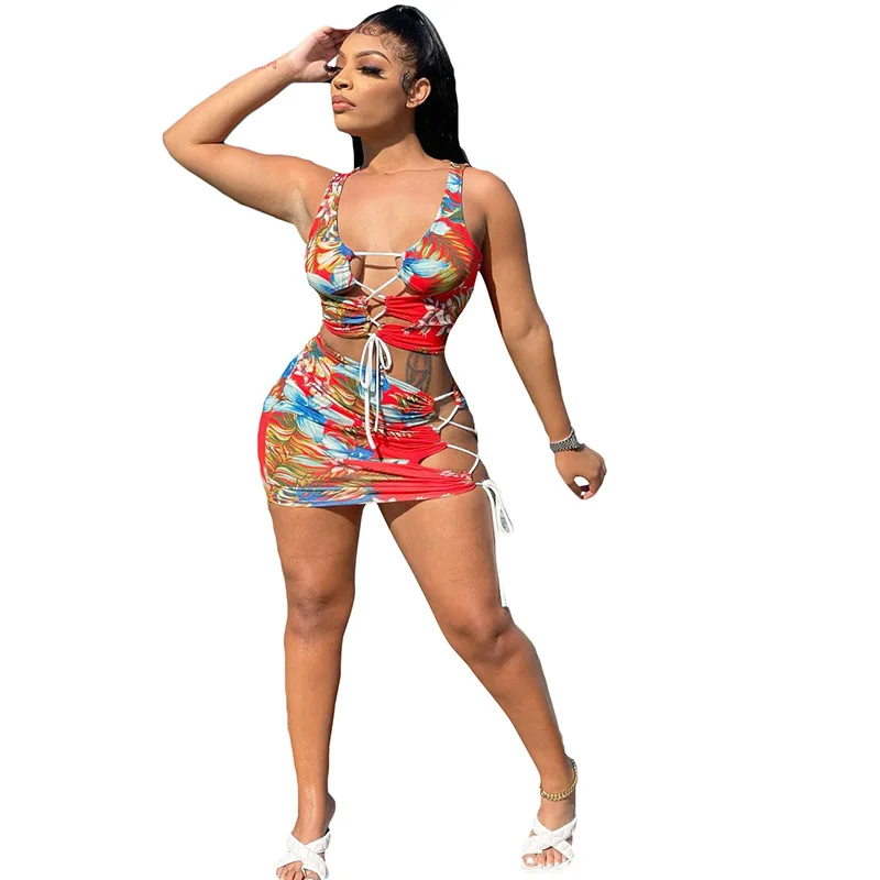 Women Cross Bandage Hollow Out Skirts Set Fashion Floral Print Vest Crop Top Mini Skirt Summer Sexy Casual Lady Outfits 2021 New
Women Cross Bandage Hollow Out Skirts Set Fashion Floral Print Vest Crop Top Mini Skirt Summer Sexy Casual Lady Outfits 2021 New