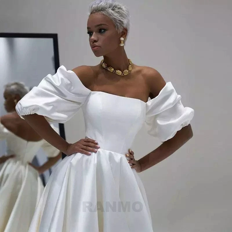 RANMO Simple A Line Satin Wedding Dress Off the Shoulder Short Puffy Sleeves Ankle Length Bride Party Gowns 2021 Formal Wear
RANMO Simple A Line Satin Wedding Dress Off the Shoulder Short Puffy Sleeves Ankle Length Bride Party Gowns 2021 Formal Wear