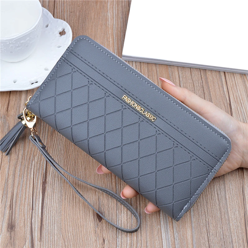 New Tassel Women Wallet PU Leather Clutch Solid Color Fashion Lattice Zipper Female Casual Coin Purse Handbag
New Tassel Women Wallet PU Leather Clutch Solid Color Fashion Lattice Zipper Female Casual Coin Purse Handbag