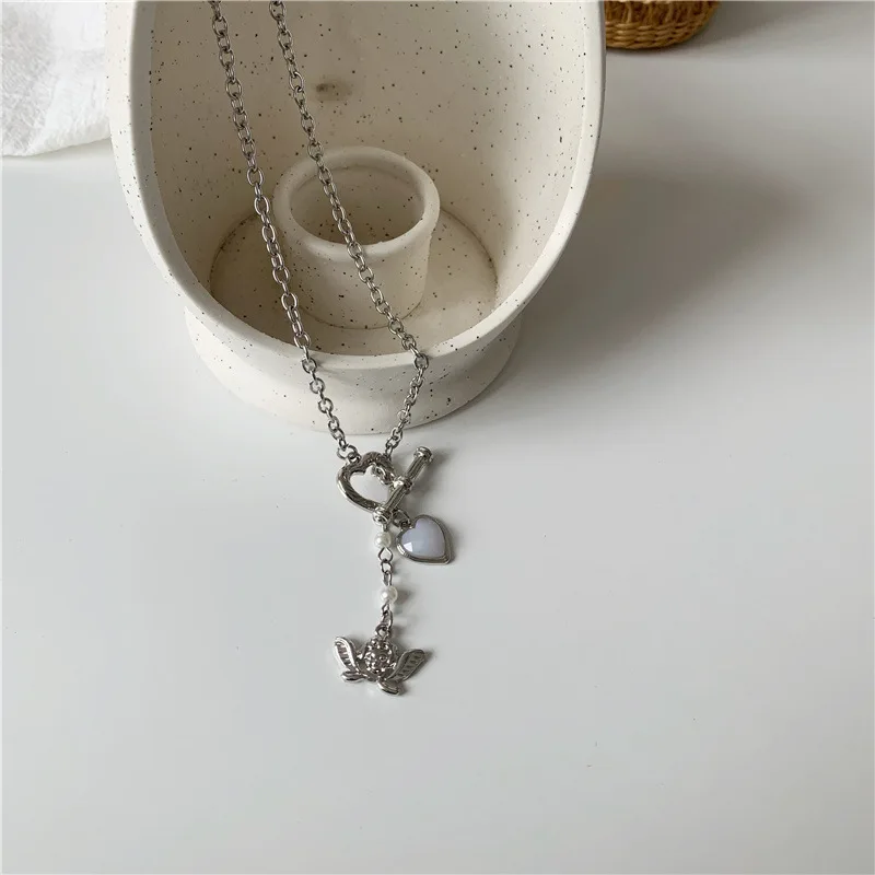 Origin Summer Fashion Angel Love Heart Hollow Out Pendant Necklace for Women Statement Rhinestone Toggle Clasp Necklace Jewelry
Origin Summer Fashion Angel Love Heart Hollow Out Pendant Necklace for Women Statement Rhinestone Toggle Clasp Necklace Jewelry