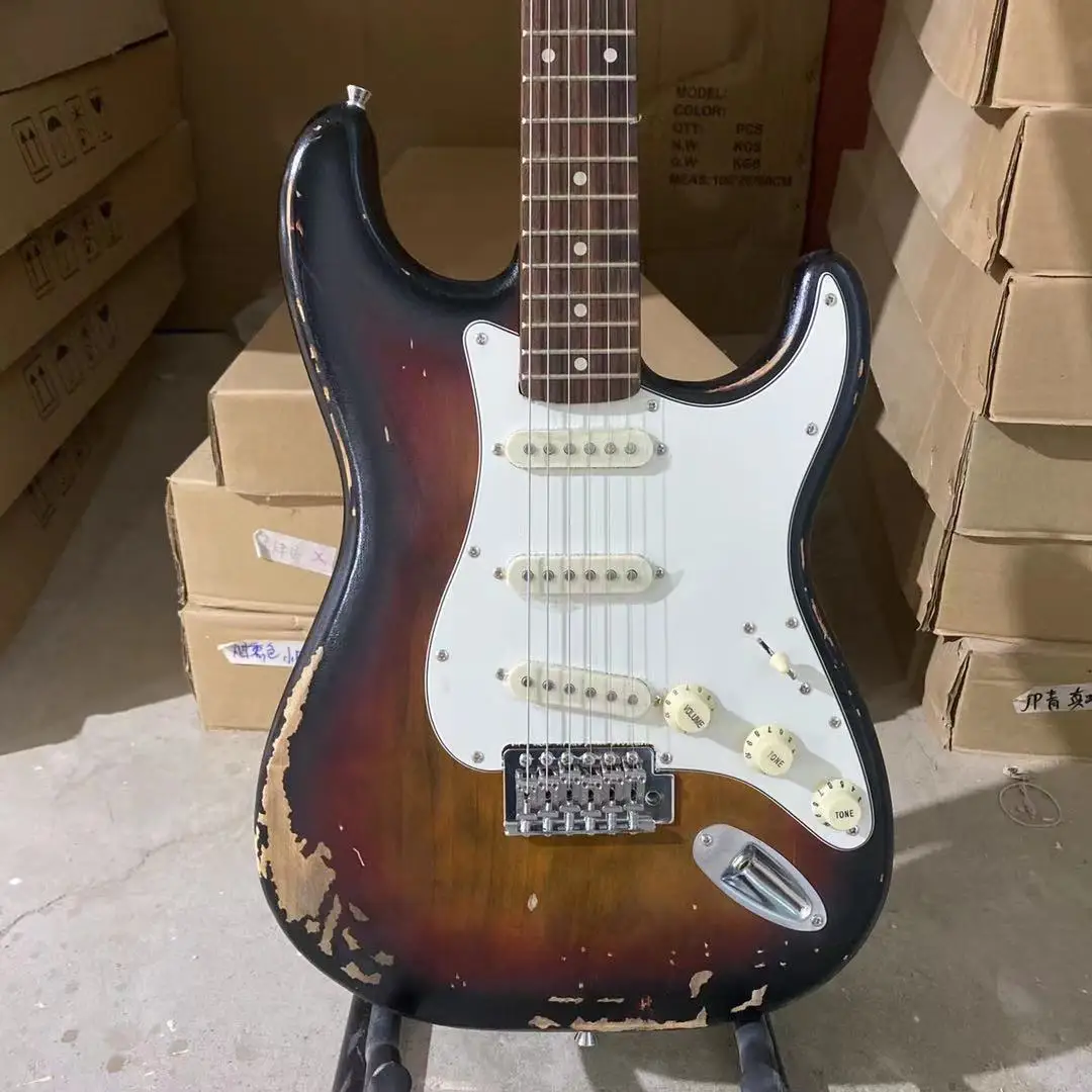 Aged ST Electric Guitar Vintage Sunburst Color Alder Body Rosewood Fingerboard 100% Man Made High Quality Guitarar Free Shipping
Aged ST Electric Guitar Vintage Sunburst Color Alder Body Rosewood Fingerboard 100% Man Made High Quality Guitarar Free Shipping