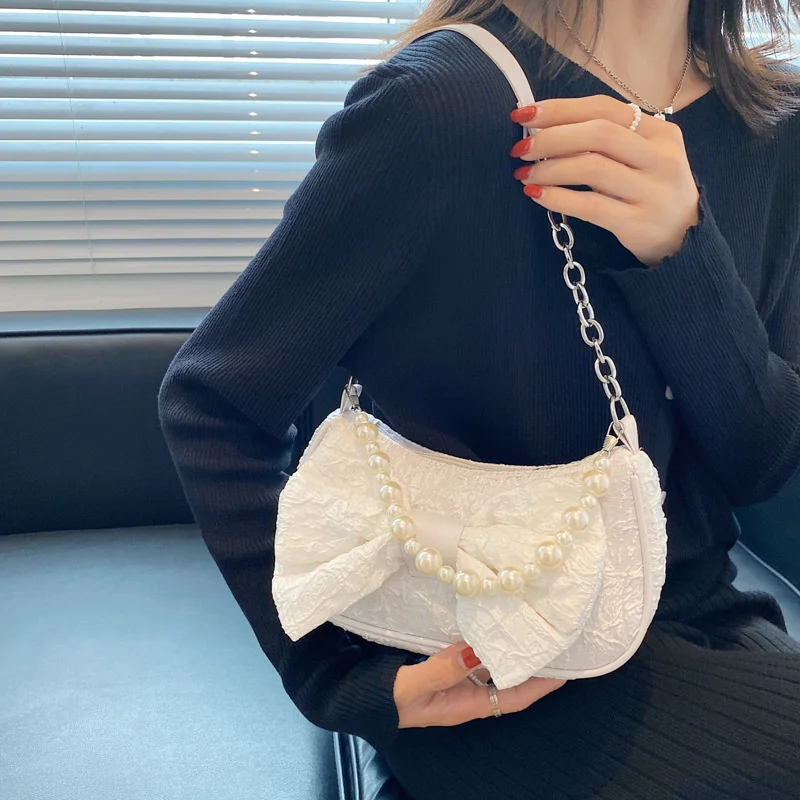 Popular Lace Bow Underarm Bag New Bag Women's Bag Summer Pearl Handbag Single Shoulder Messenger Bag
Popular Lace Bow Underarm Bag New Bag Women's Bag Summer Pearl Handbag Single Shoulder Messenger Bag