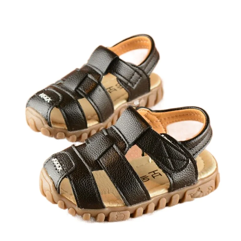 Children's sandals 2021 summer children's leather face Baotou soft sole boys' sandals fashion solid color Velcro girls' sandals
Children's sandals 2021 summer children's leather face Baotou soft sole boys' sandals fashion solid color Velcro girls' sandals