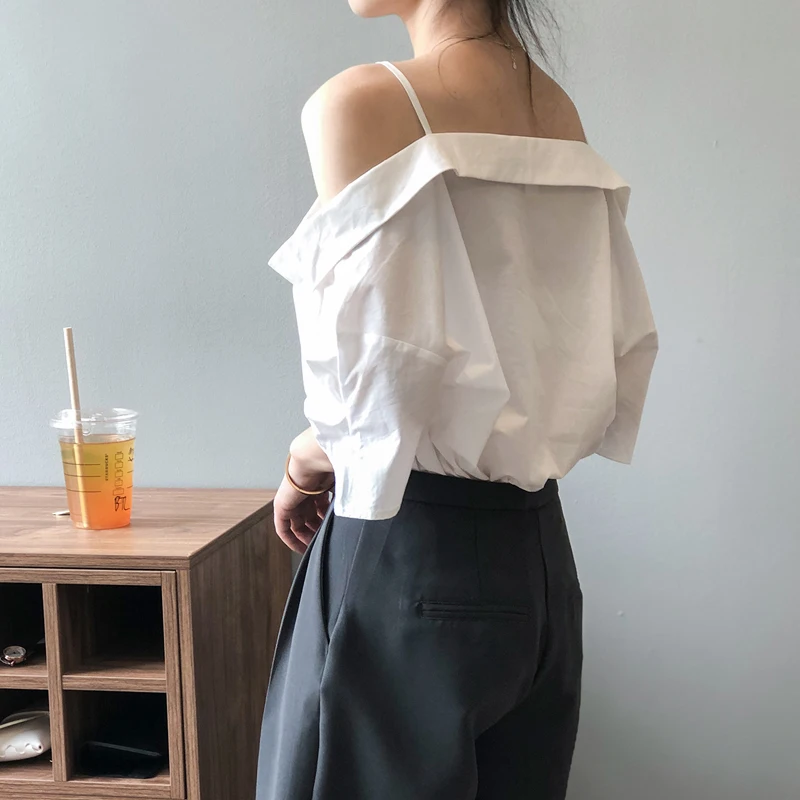 Unique Summer New Shoulder Sling Shirt Women's Design Sense French Off Shoulder Smart Top Sexy Women's White Tuxedo Shirt 3078
Unique Summer New Shoulder Sling Shirt Women's Design Sense French Off Shoulder Smart Top Sexy Women's White Tuxedo Shirt 3078