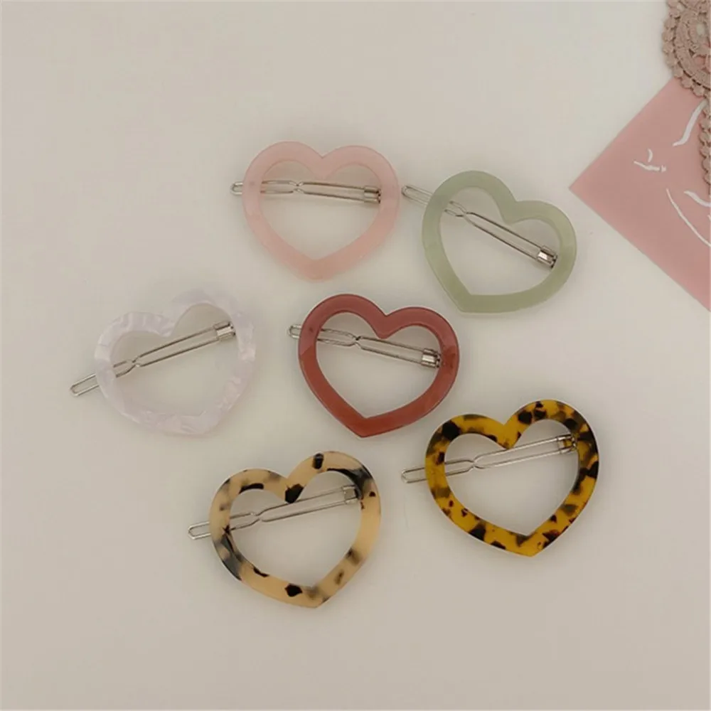 New Arylic Heart Shaped Hair Clips For Women Acetate Barrette Headwear Leopard Hairpin Girls Hair Styling Accessories
New Arylic Heart Shaped Hair Clips For Women Acetate Barrette Headwear Leopard Hairpin Girls Hair Styling Accessories