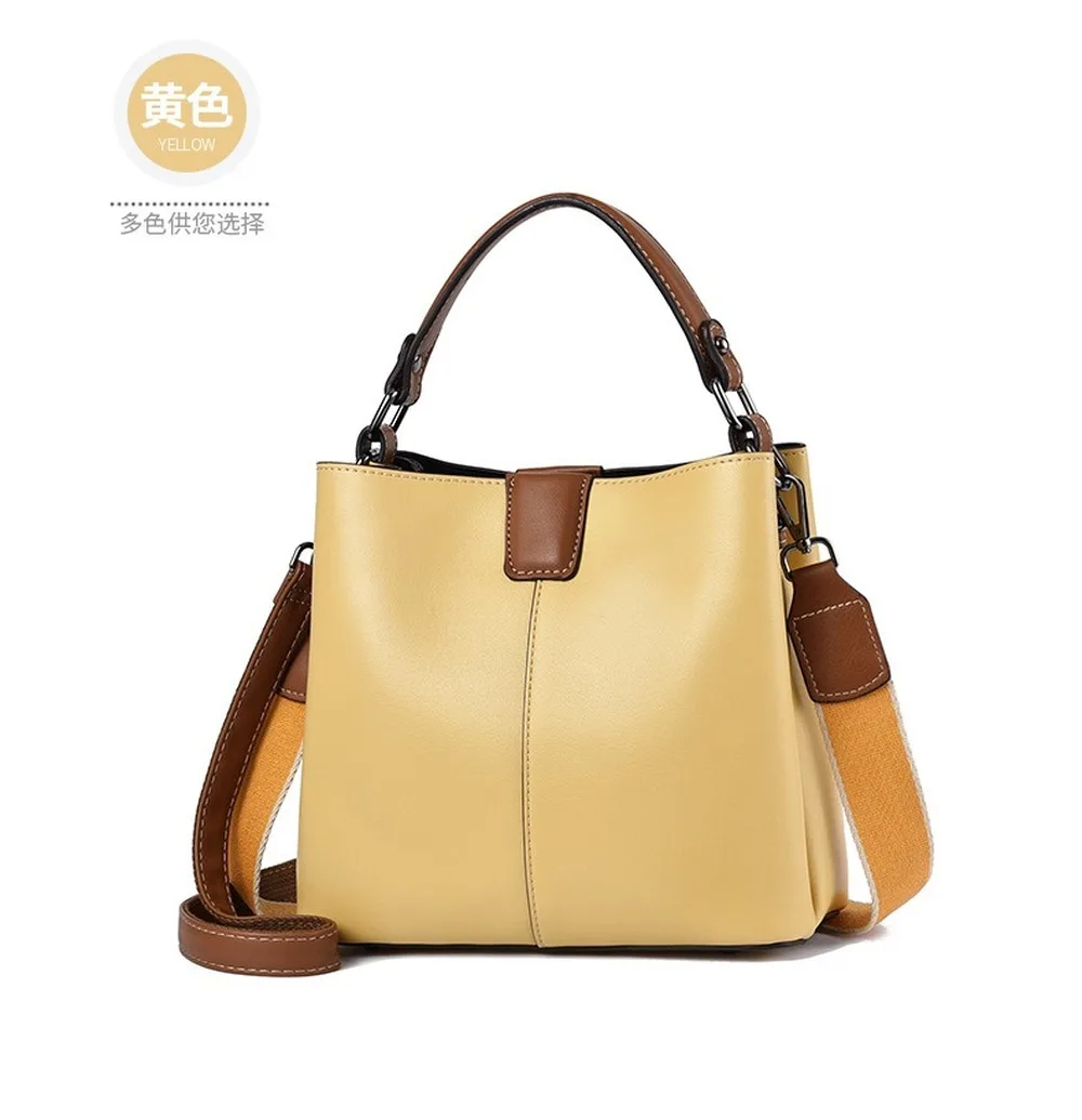 Bucket bag female bag 2021 new large-capacity handbag fashion hit color wide band shoulder messenger bag
Bucket bag female bag 2021 new large-capacity handbag fashion hit color wide band shoulder messenger bag