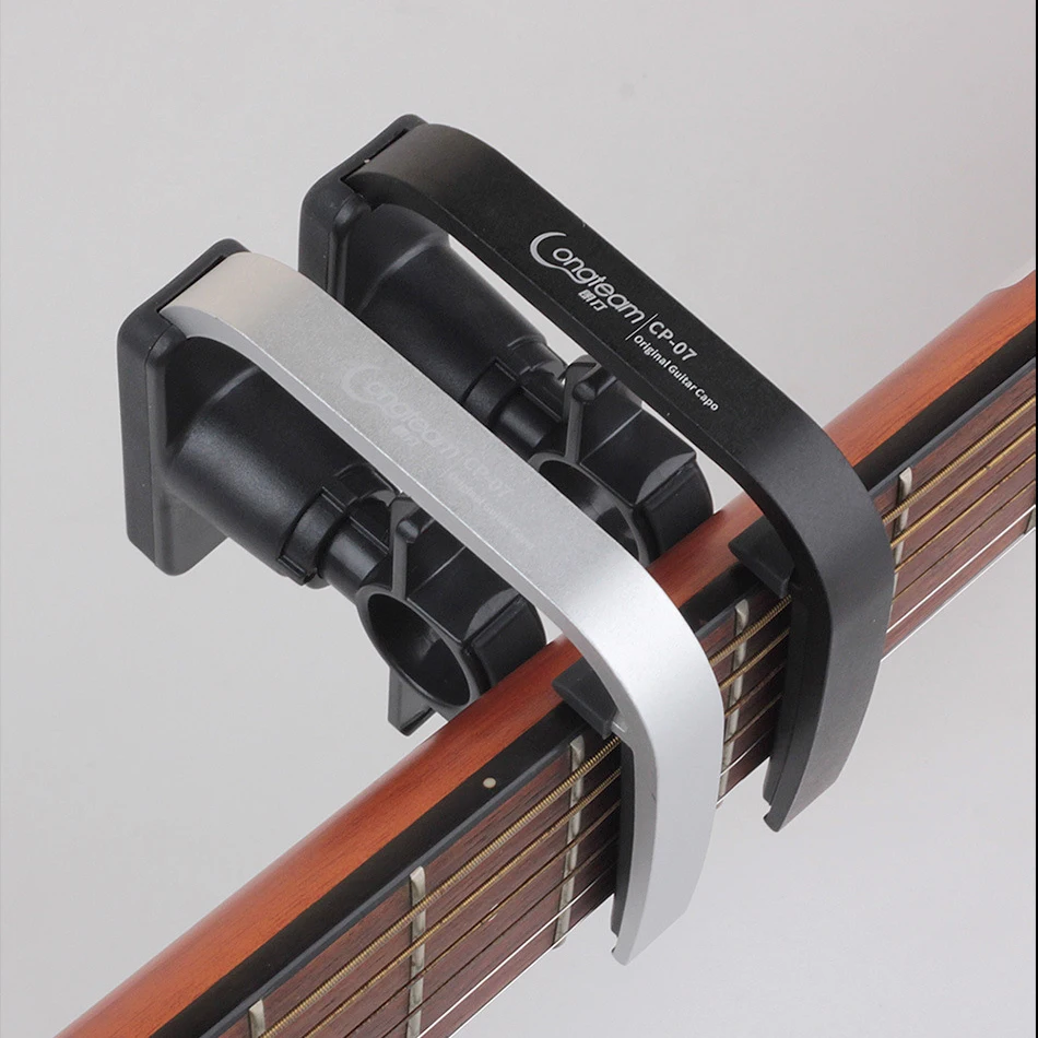 Lang Team Aluminum Alloy Tone Clip Innovative Folk Acoustic Guitar Tone Tuning Clip Features Guitar Capo
Lang Team Aluminum Alloy Tone Clip Innovative Folk Acoustic Guitar Tone Tuning Clip Features Guitar Capo