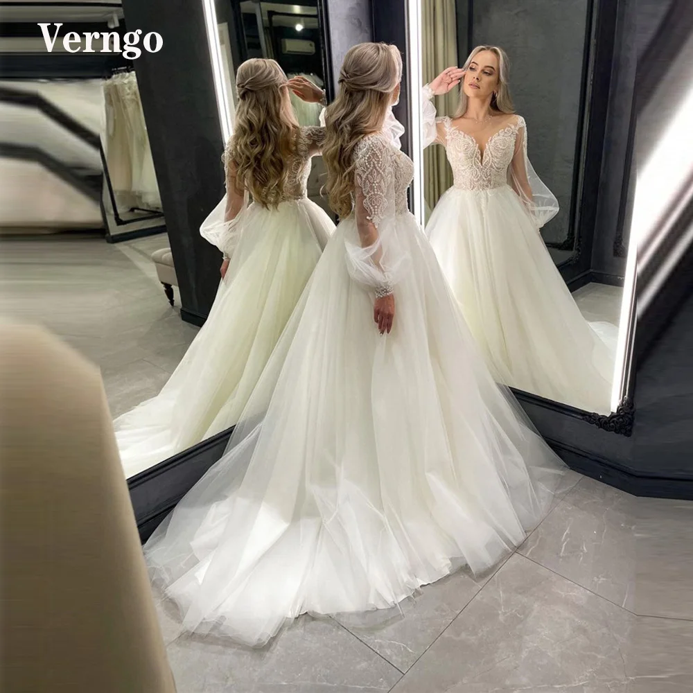 Verngo Romantic Lace Applique Tulle A Line Wedding Dress Sheer Neck Puff Long Sleeves Beads Pearls Bridal Gowns Robe de mariage
Verngo Romantic Lace Applique Tulle A Line Wedding Dress Sheer Neck Puff Long Sleeves Beads Pearls Bridal Gowns Robe de mariage
