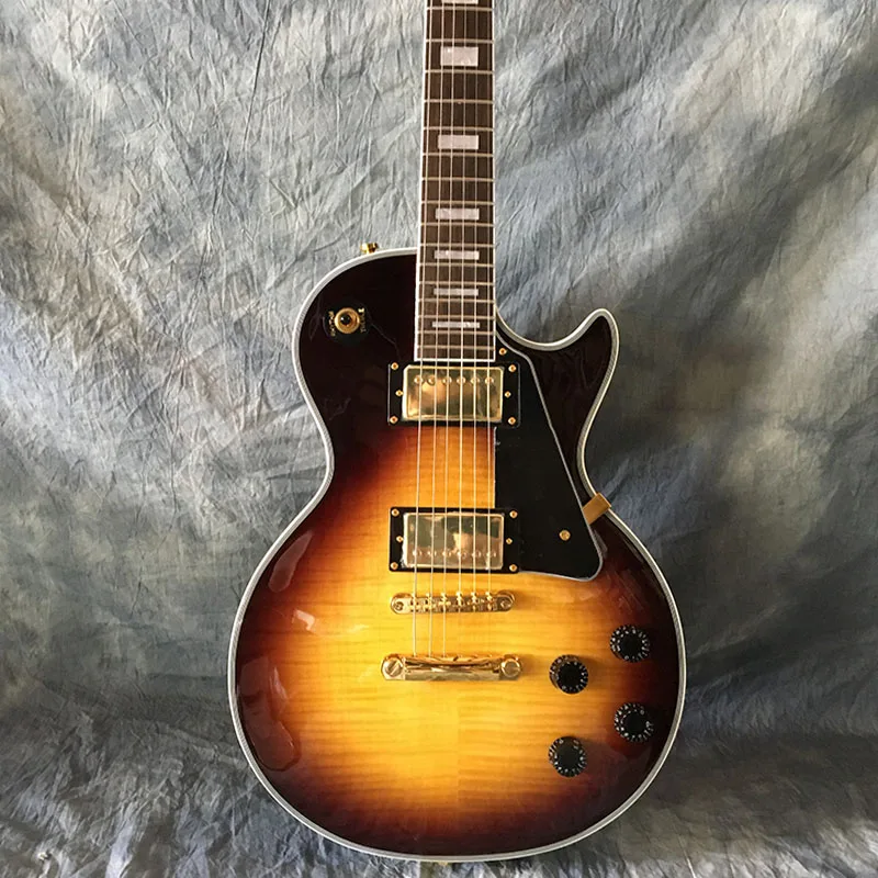 High-quality 6-string electric guitar, peach core xylophone, tiger skin with white edging, free shipping.
High-quality 6-string electric guitar, peach core xylophone, tiger skin with white edging, free shipping.