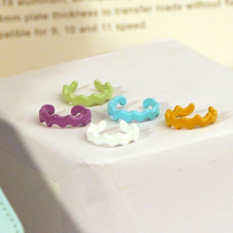 Trendy Women Irregular Wave Shaped Opening Candy Ring Geometric Hand-painted Party Ring Jewelry
Trendy Women Irregular Wave Shaped Opening Candy Ring Geometric Hand-painted Party Ring Jewelry