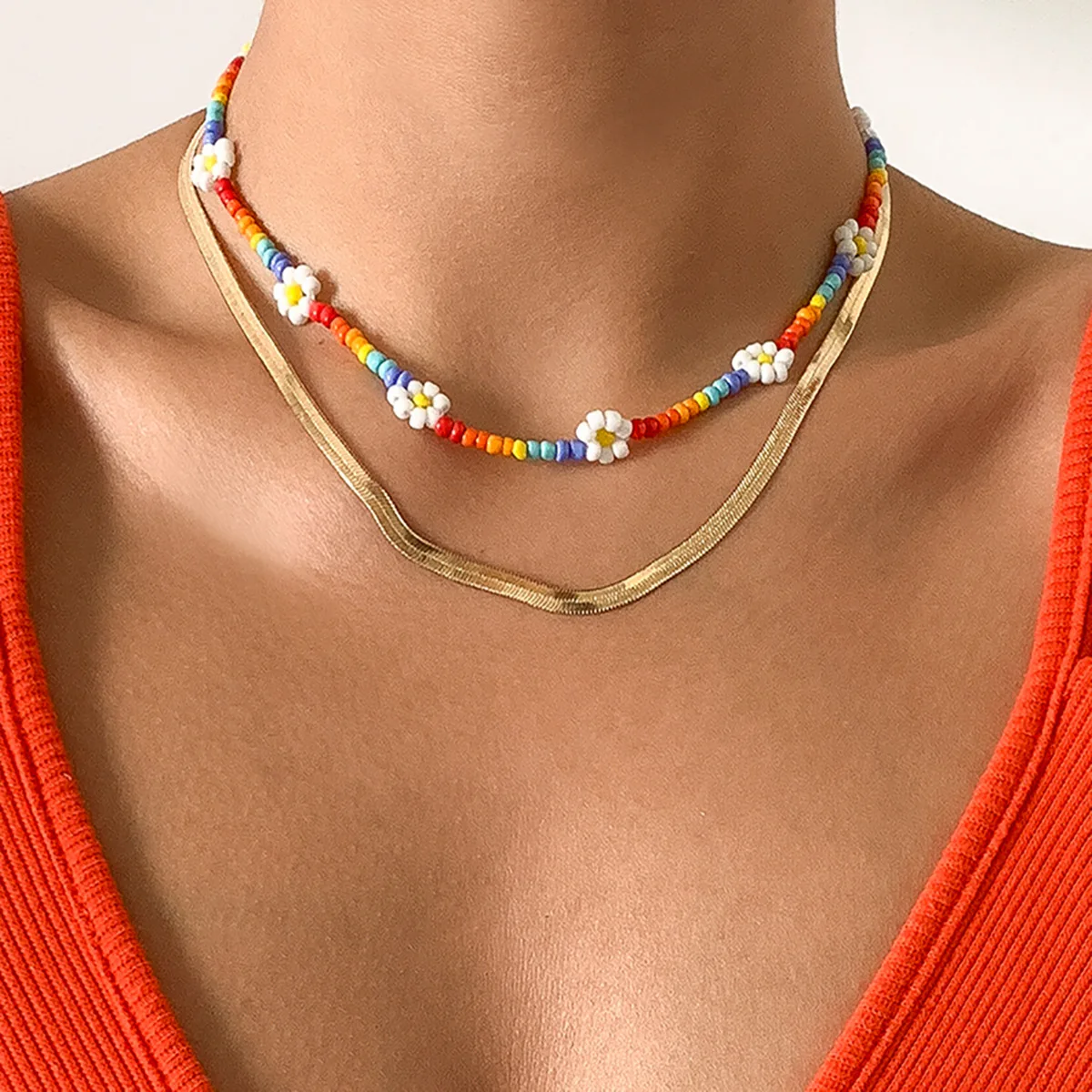 Bohemian necklace for women with multicolor daisy rice bead woven necklace retro temperament metal snake bone clavicle chain
Bohemian necklace for women with multicolor daisy rice bead woven necklace retro temperament metal snake bone clavicle chain