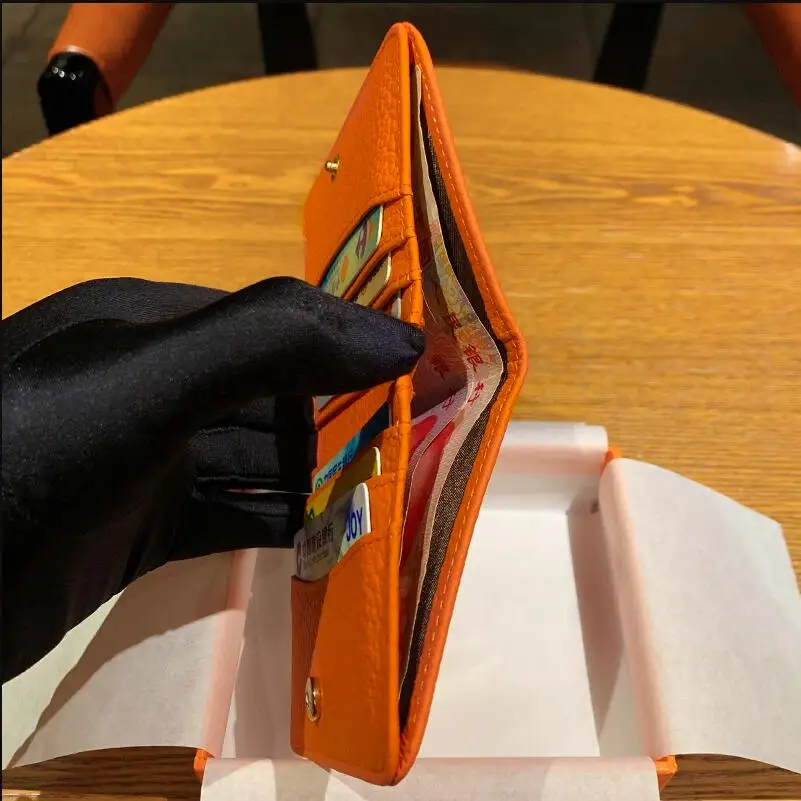 Womens Wallets and Purses Genuine Leather Luxury Designer Hollow Letter H Girls Brand Purse Ladies Money Short Wallet
Womens Wallets and Purses Genuine Leather Luxury Designer Hollow Letter H Girls Brand Purse Ladies Money Short Wallet
