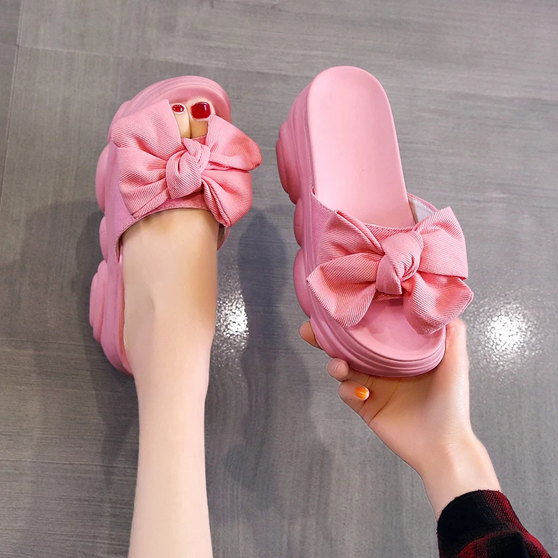 Sweet pink thick-soled women's shoes summer new style outer wear fashionable slope heel increase bow sandals and slippers
Sweet pink thick-soled women's shoes summer new style outer wear fashionable slope heel increase bow sandals and slippers