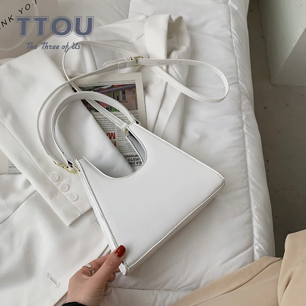 Half Moon Design PU Leather Shoulder Bags For Women Branded Simple Trendy Luxury Small Handbags Female Travel Underarm Bags
Half Moon Design PU Leather Shoulder Bags For Women Branded Simple Trendy Luxury Small Handbags Female Travel Underarm Bags