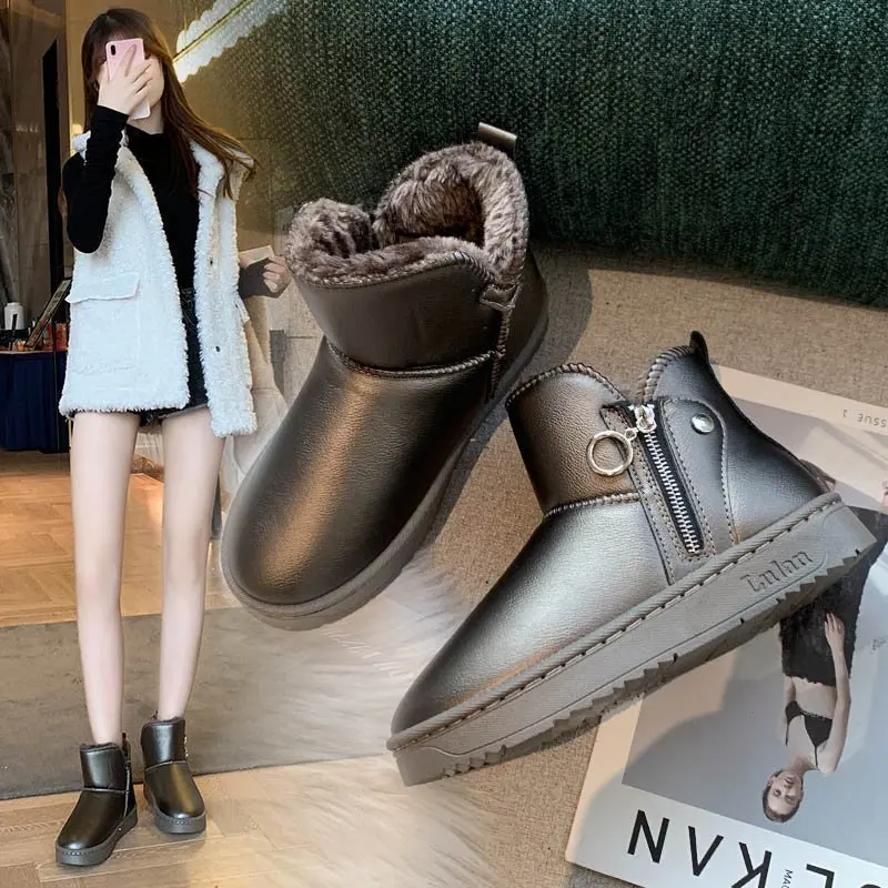 New winter cotton shoes plus velvet thick snow boots flat warm short boots fashion versatile and comfortable personality trend 
New winter cotton shoes plus velvet thick snow boots flat warm short boots fashion versatile and comfortable personality trend