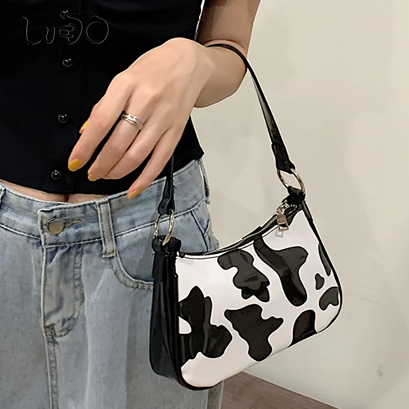 LUCDO Fashion women's small baguette bag luxury brand Milk Cow Print female messenger shoulder bag Women Leather Handbags
LUCDO Fashion women's small baguette bag luxury brand Milk Cow Print female messenger shoulder bag Women Leather Handbags