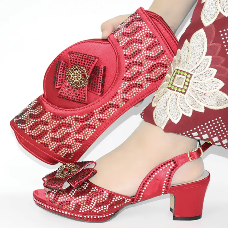 Hot Sale Wine Color Ladies Shoes With Flowers Style Bag Set African Style Woman High Heels Shoes And Bag Set For Wedding Dress
Hot Sale Wine Color Ladies Shoes With Flowers Style Bag Set African Style Woman High Heels Shoes And Bag Set For Wedding Dress