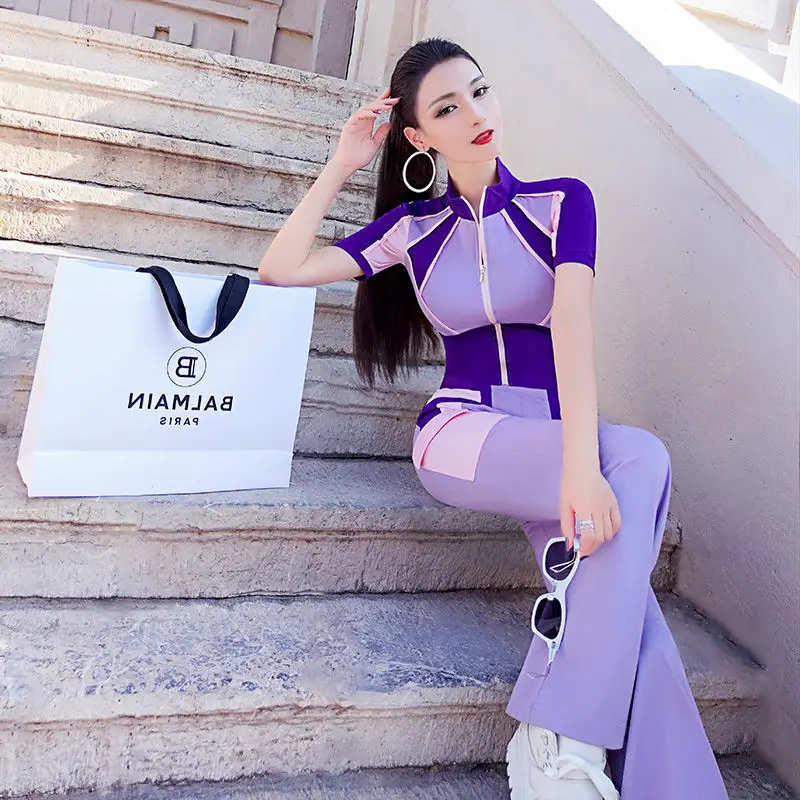 Summer Leisure Sports Show Thin Age Reducing Suit 2021 New Style Temperament Splicing Short Sleeve Top Flared Pants Two Piece
Summer Leisure Sports Show Thin Age Reducing Suit 2021 New Style Temperament Splicing Short Sleeve Top Flared Pants Two Piece